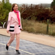 French Ecology Minister Ségolène Royal walks on the new solar road.